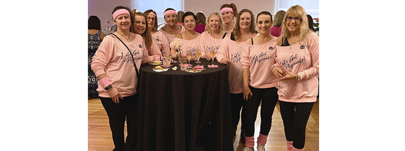 women dressed in pink attire attending cancer support community south bay fundraiser