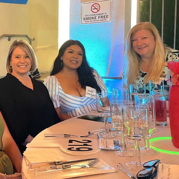 3 women at Grand Grunion Gala Glow event