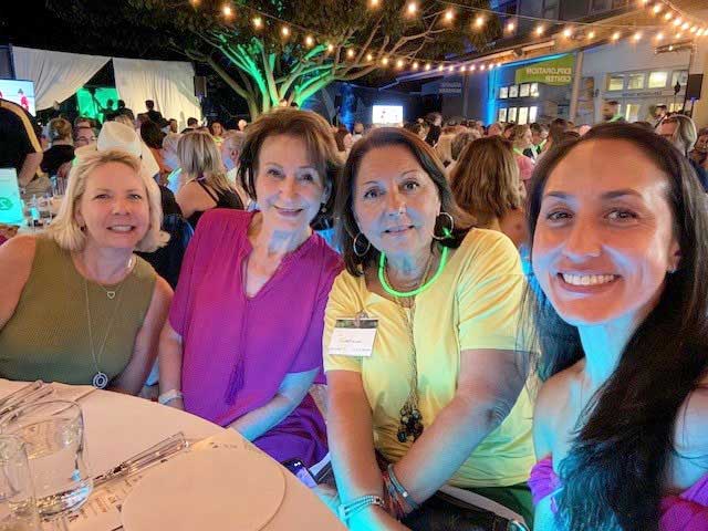 4 women attending Grand Grunion Gala Glow event