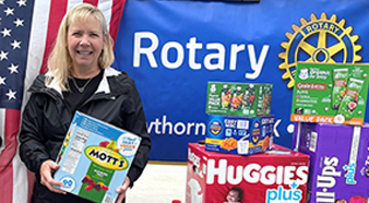 Julia Parton displaying donations for Camp Pendelton Military families. 