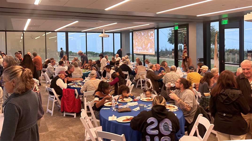 group of people eating dinner