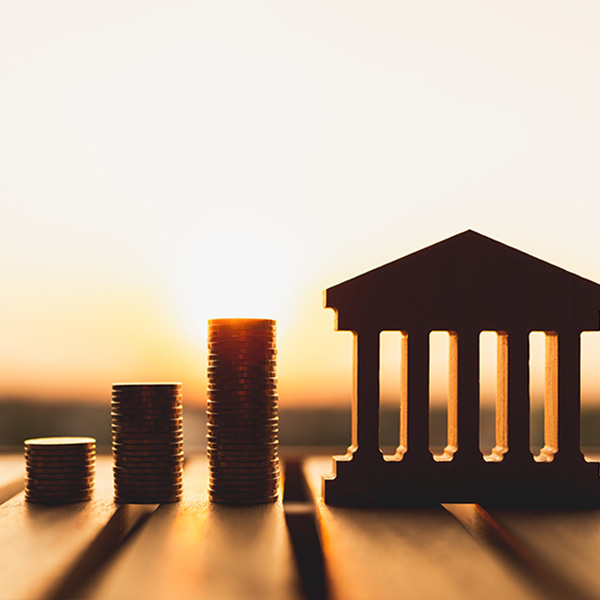 Stack of coins and courthouse model