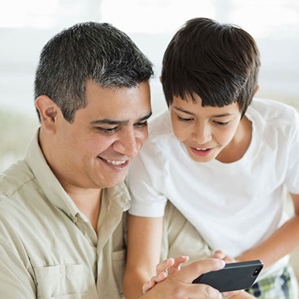 father sitting with his son