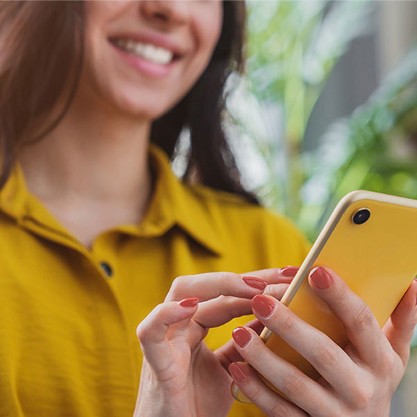 woman holding a cell phone