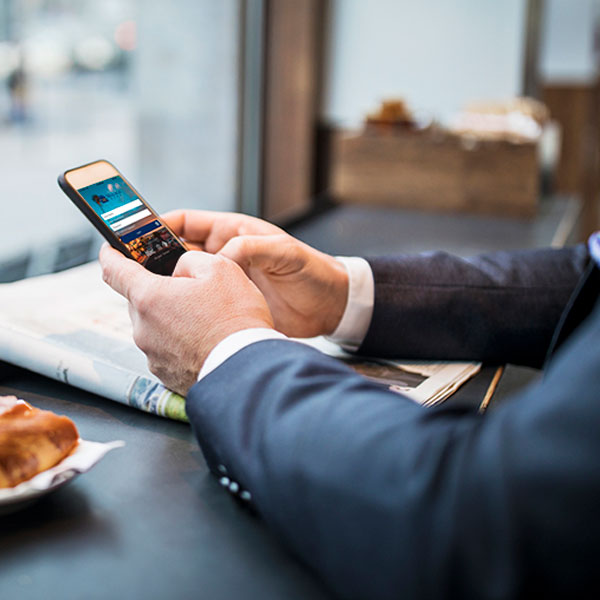Man holding a mobile phone.