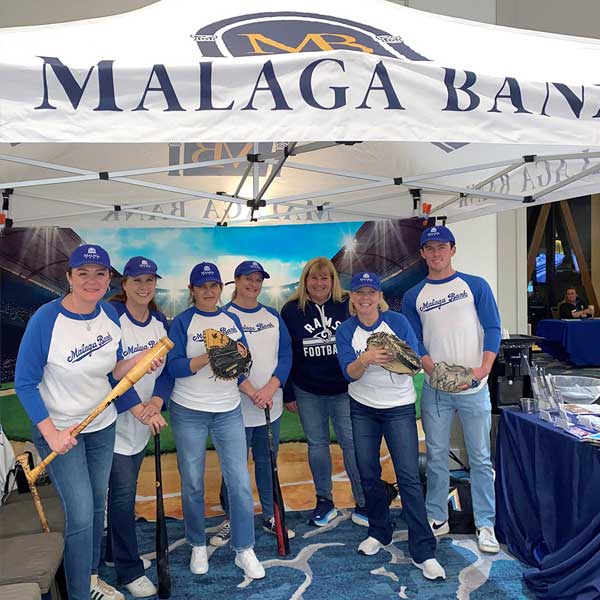 group of people at Torrance Business Expo dressed in baseball players uniforms