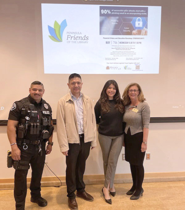 women standing next police officer and IT tech