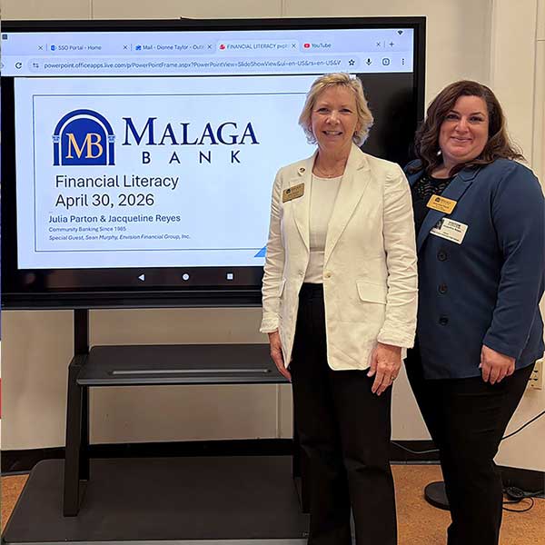 2 women from Malaga Bank at event