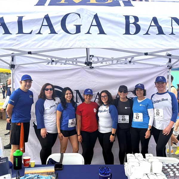 Malaga Bank team at the booth
