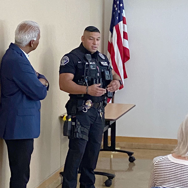Police office with another man