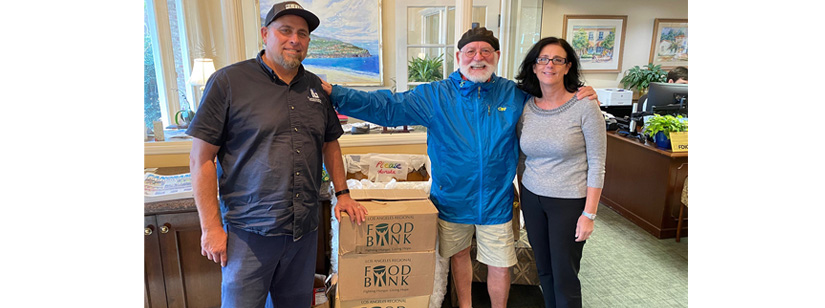 men from St Lawrence Martyr church picking up food donations