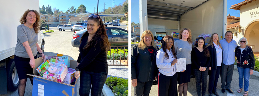 malaga staff presenting donated toys to military crew picking the toys up